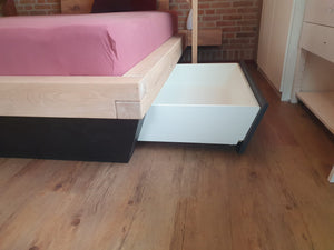 Balken bed met opbergruimte