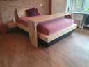 Balken bed met opbergruimte