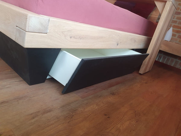 Balken bed met opbergruimte